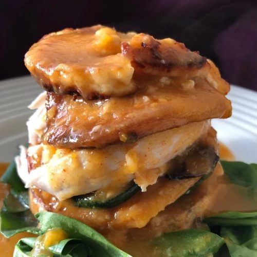 Chicken and vegetable stacker with broth sauce